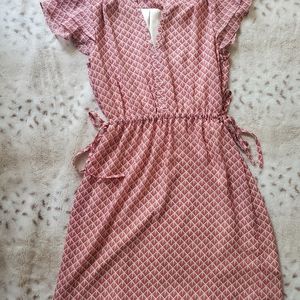 Coral and cream dress